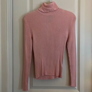 Pink long sleeved turtleneck sweater